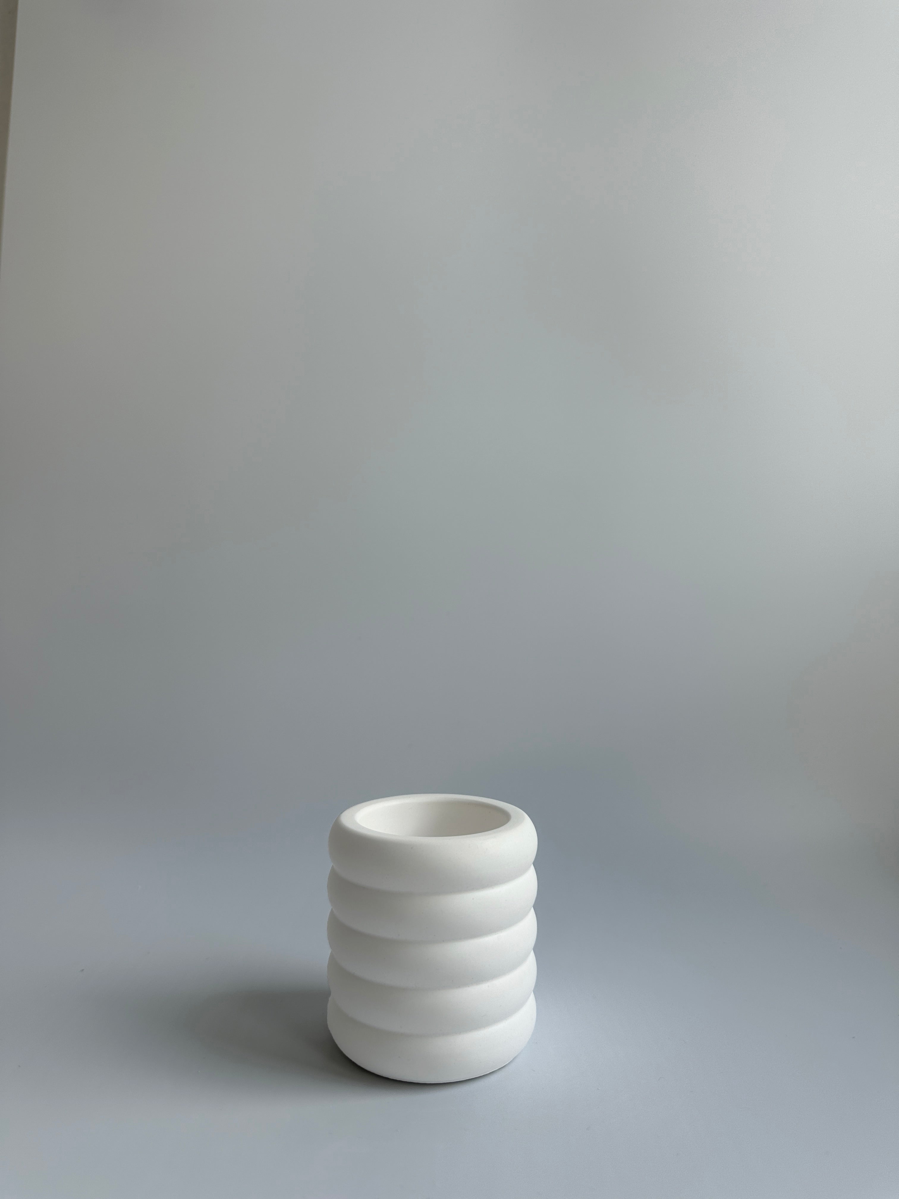 Aufbewahrungsbecher Welle